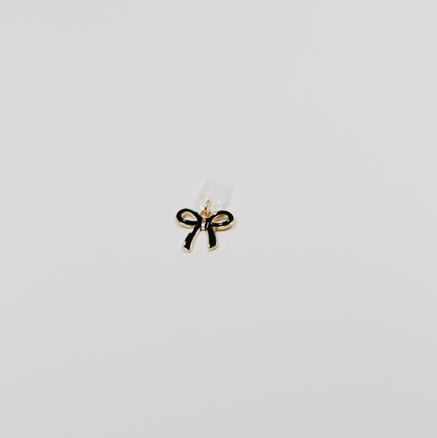 black bow • Charm