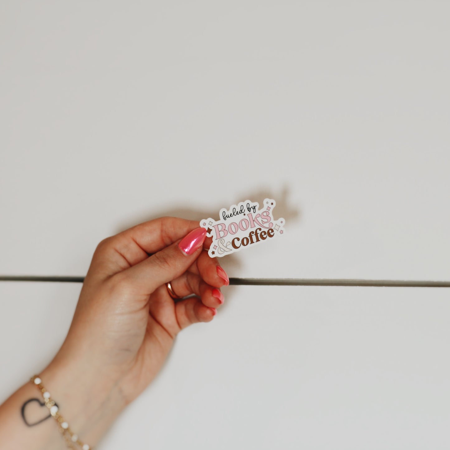 fueled by books & coffee • Sticker